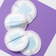 Contoured fit under clothing keeps Lansinoh pads discreet.