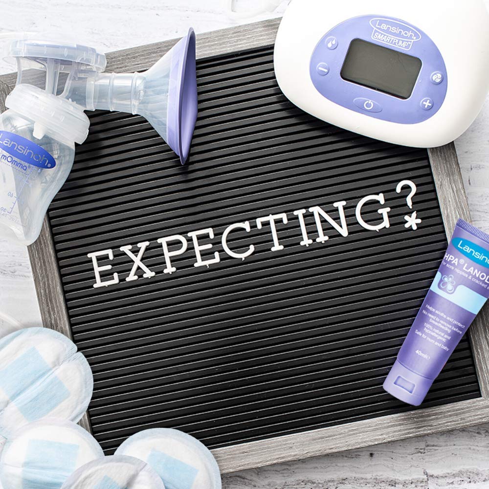 Lansinoh Stay Dry pads shown in a bag for quick, on-the-go protection.