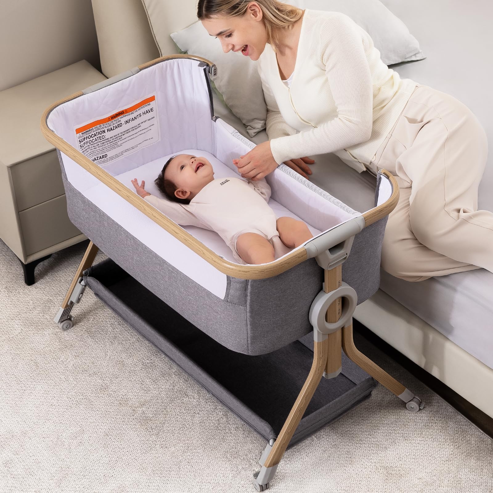 Larex baby bassinet bedside sleeper with mosquito net for safe, convenient access.