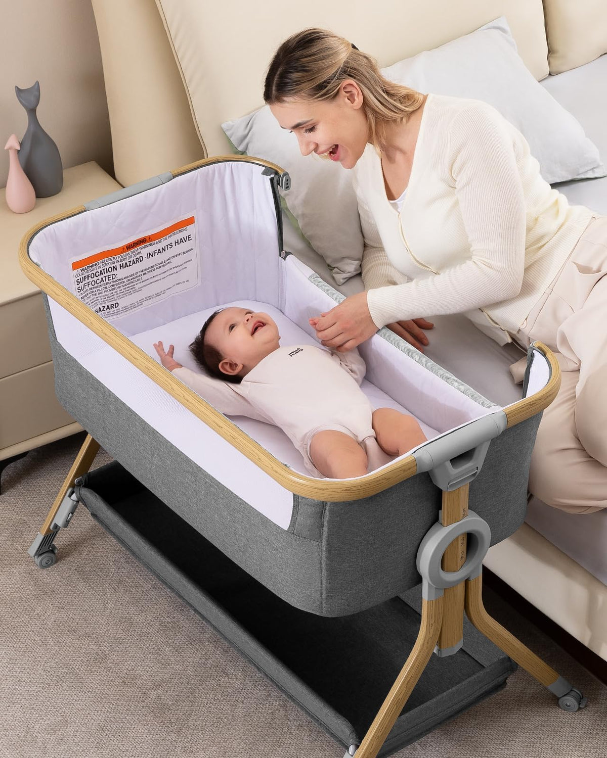 Larex Baby Bassinet bedside sleeper with storage basket for essentials within reach at night.