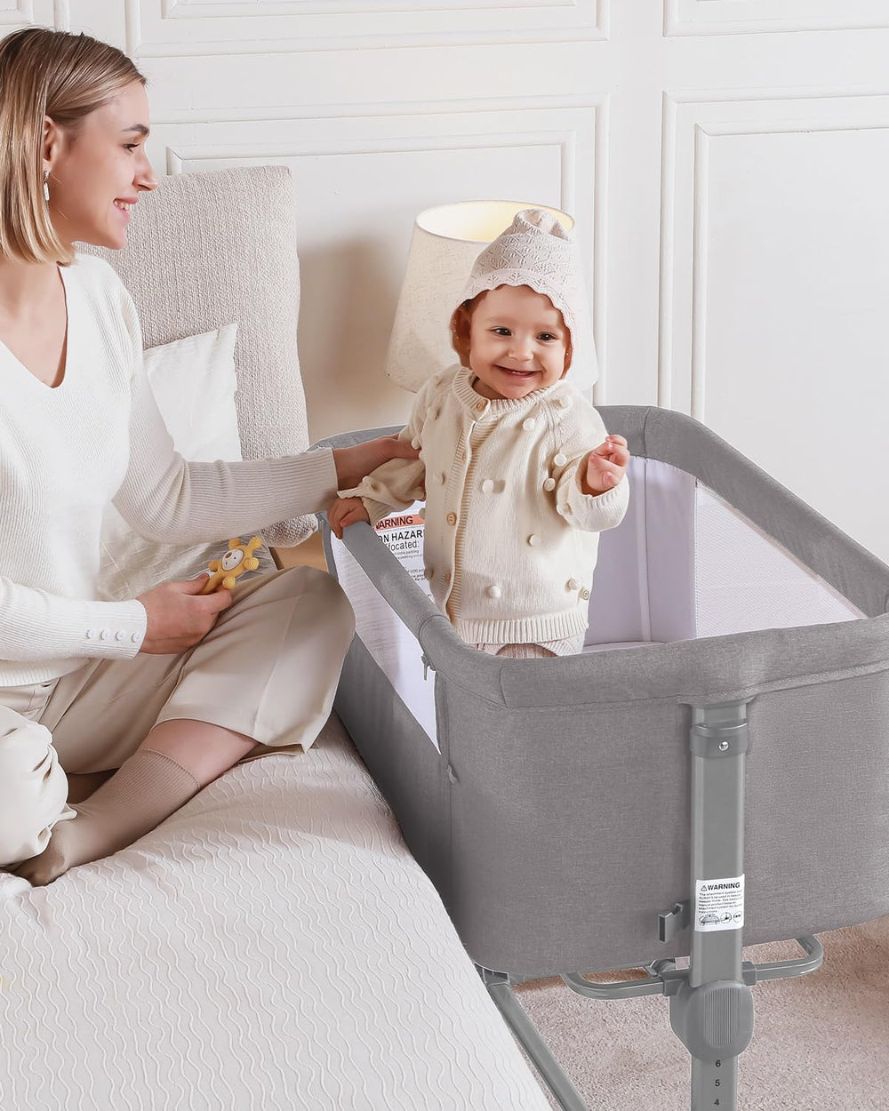 Larex bassinet with seven-height adjustment for a perfect bedside fit.