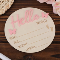Lasuroa pink Hello World plaque used as baby shower photo prop.