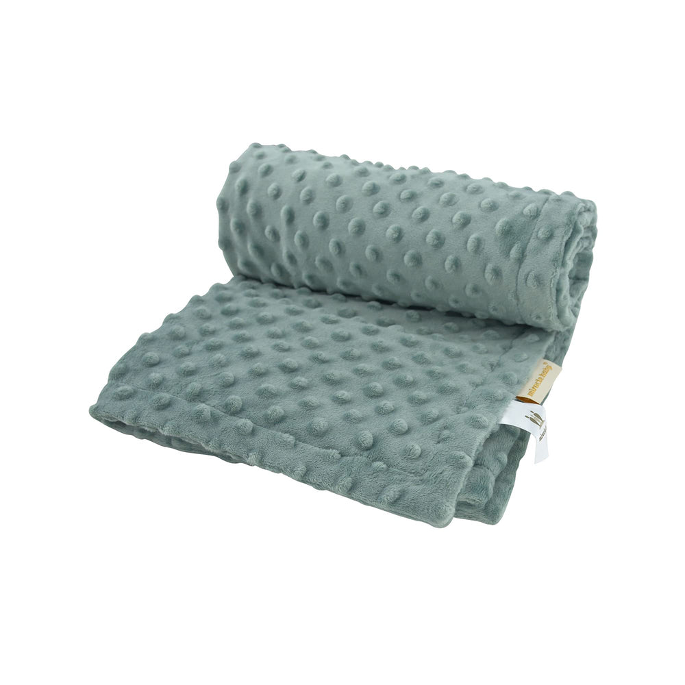 LAT LEE AND TOWN minky dot blanket folded on crib for newborn comfort.