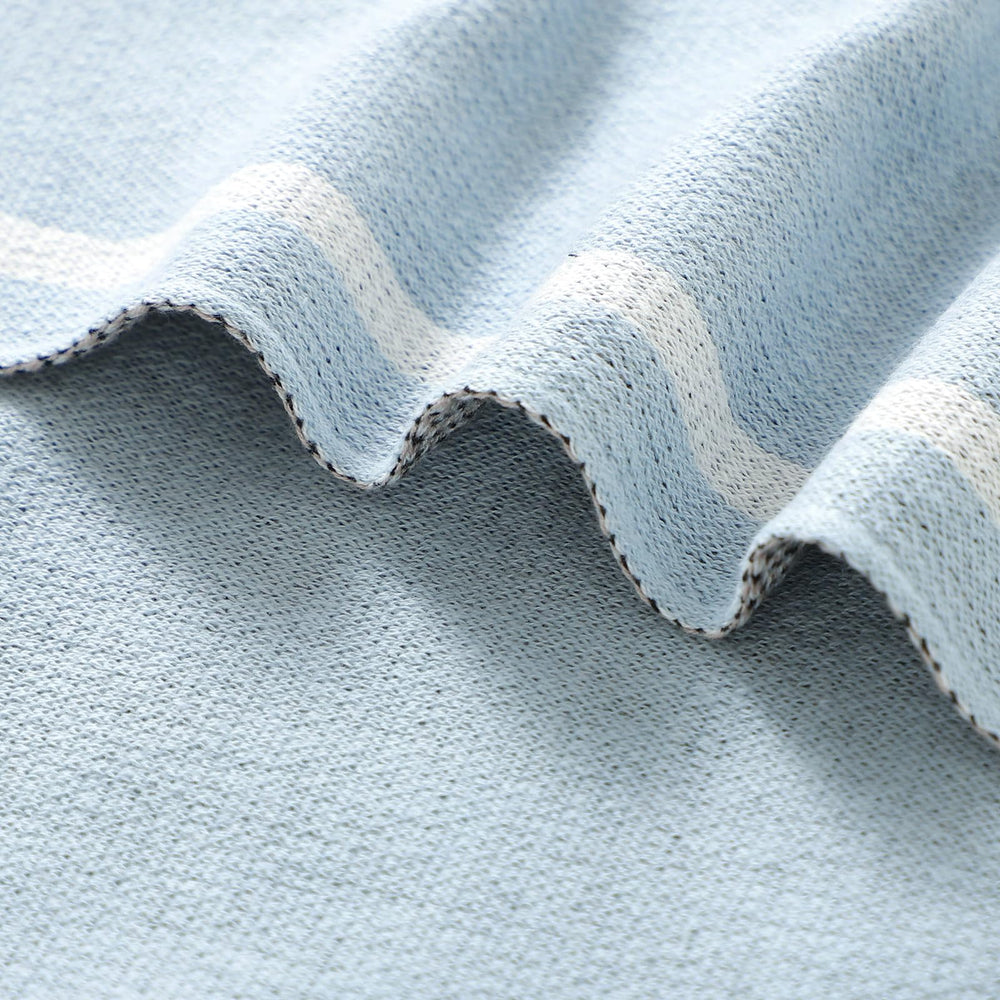 LAWKUL Babby Blanket neutral design complements any nursery theme.