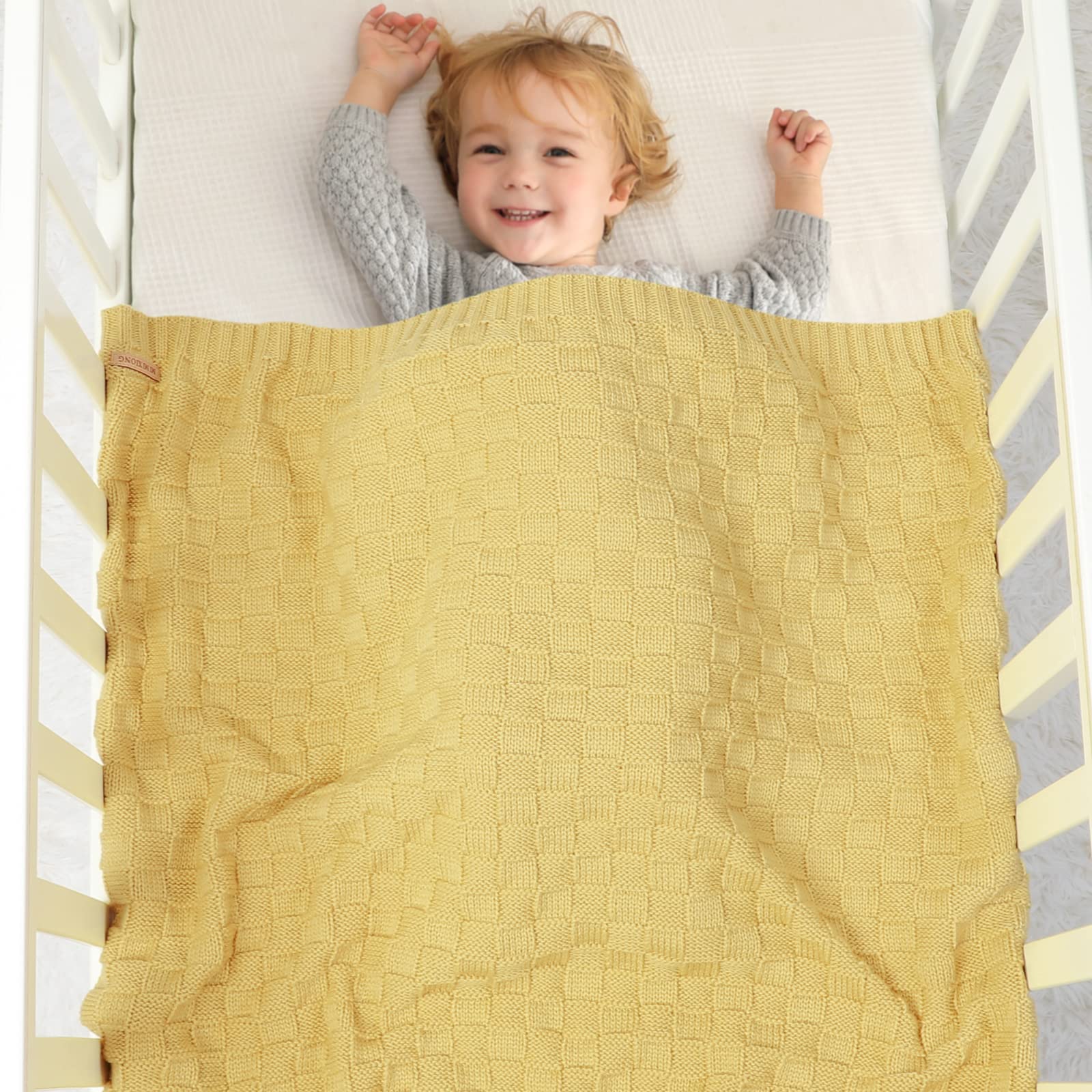 Closeup of LAWKUL Knit Cable Babe Blanket stitch showing soft texture and durability.