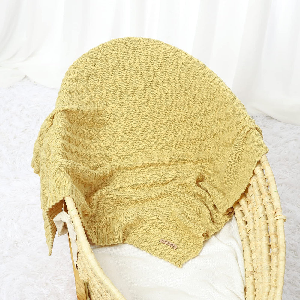 LAWKUL Baby Blanket used as nursery decor to add gentle color on crib or chair.