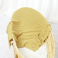 LAWKUL Baby Blanket used as nursery decor to add gentle color on crib or chair.