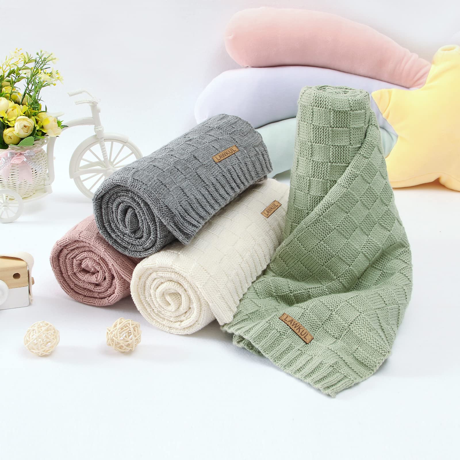 LAWKUL Travel-ready blanket paired with baby gear for easy trips.