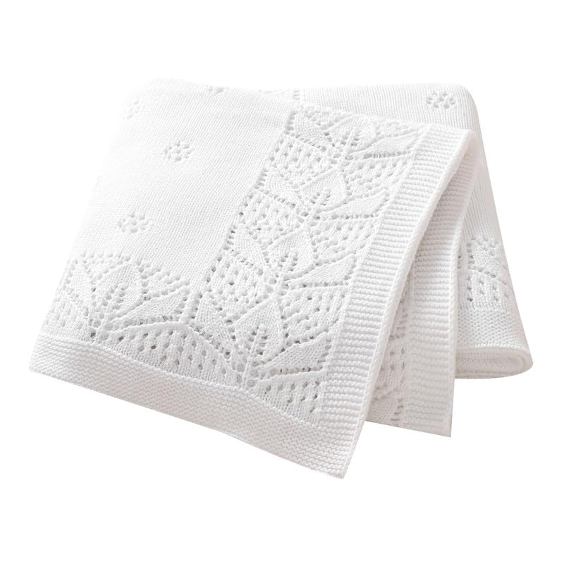 LAWKUL Cellular Blanket macaron tones complement nursery decor.