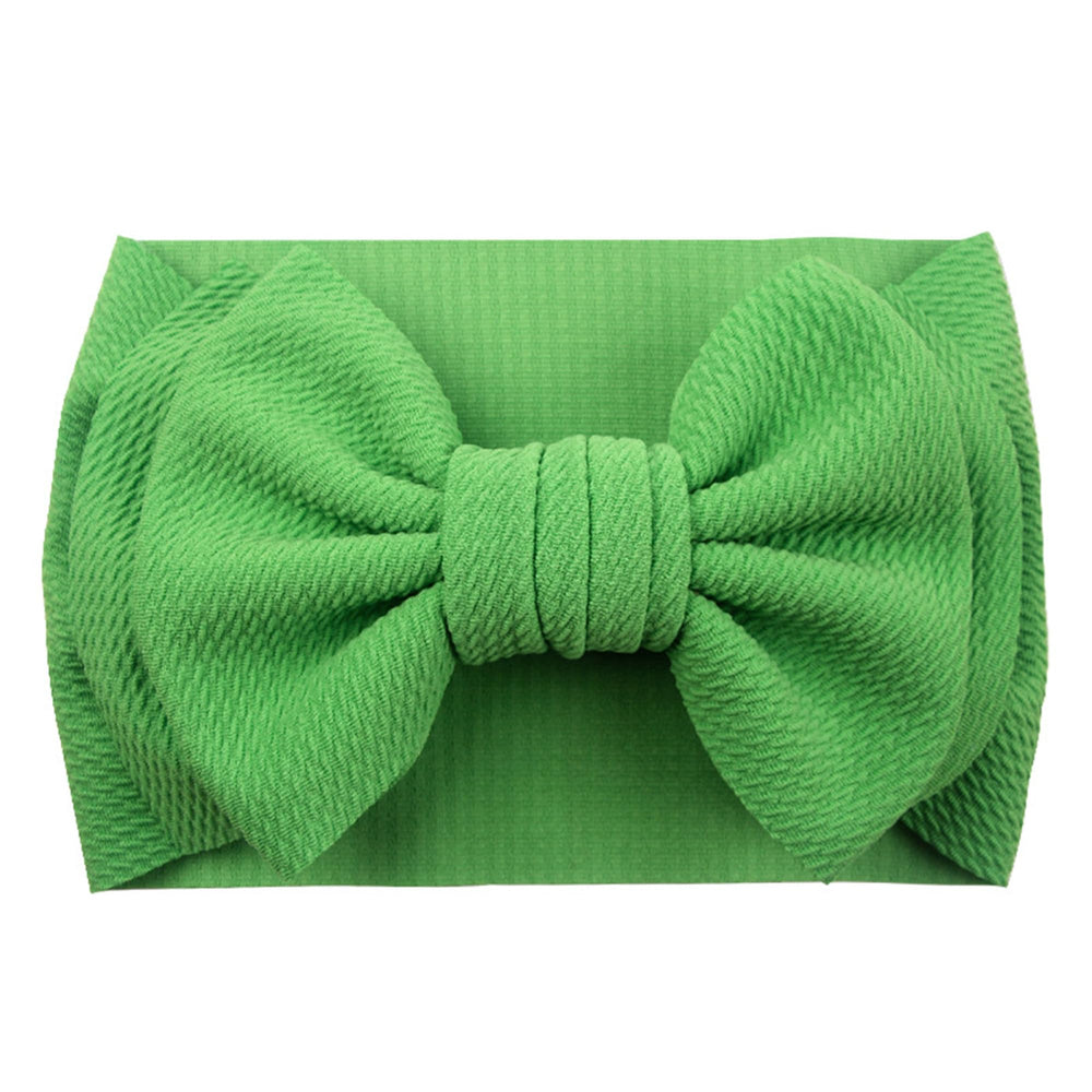 LDDCX baby bows headband elastic band, side view, easy wear for active days.