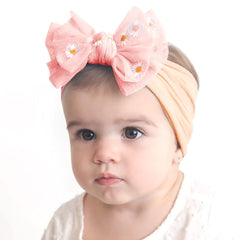 LDDCX infant floral bow headband in blush adds charm to outfits