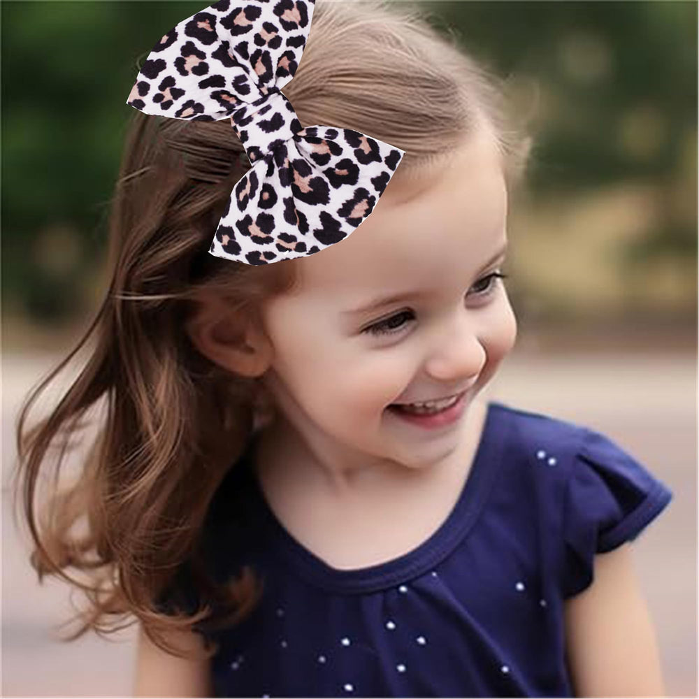 LDDCX Leopard print glitter hair accessory ideal for parties and photos.