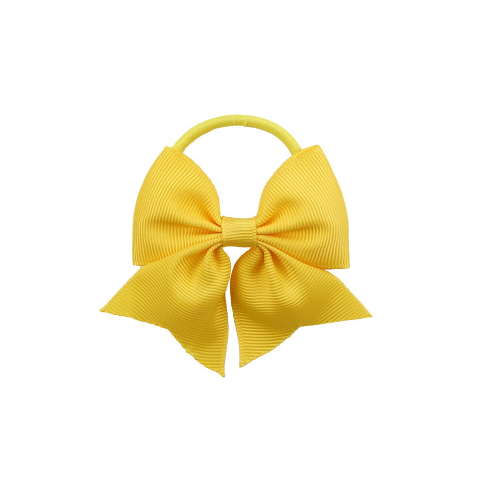 Closeup of LDDCX yellow bows on durable elastic for toddler ponytails