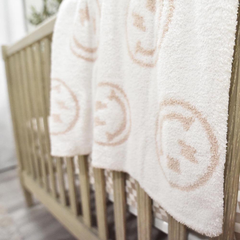 Leaps + Legends blanket ready for stroller or car seat outings.