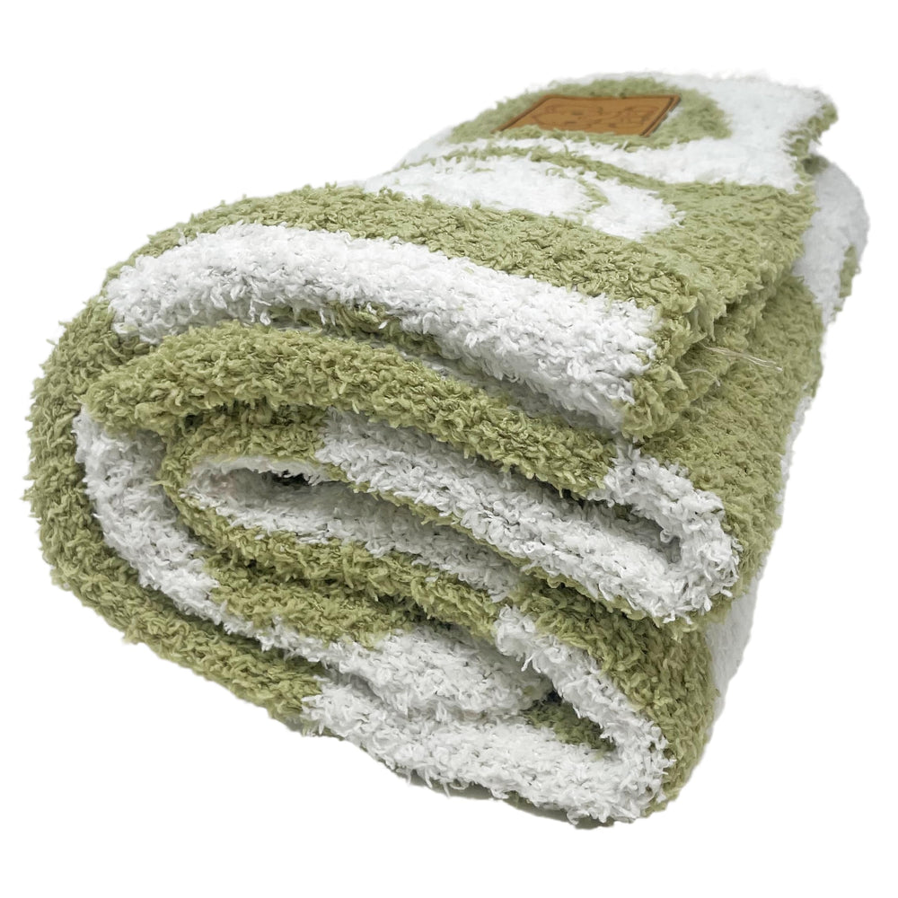 Leaps + Legends cozy nursery decor throw doubles as a decorative accent