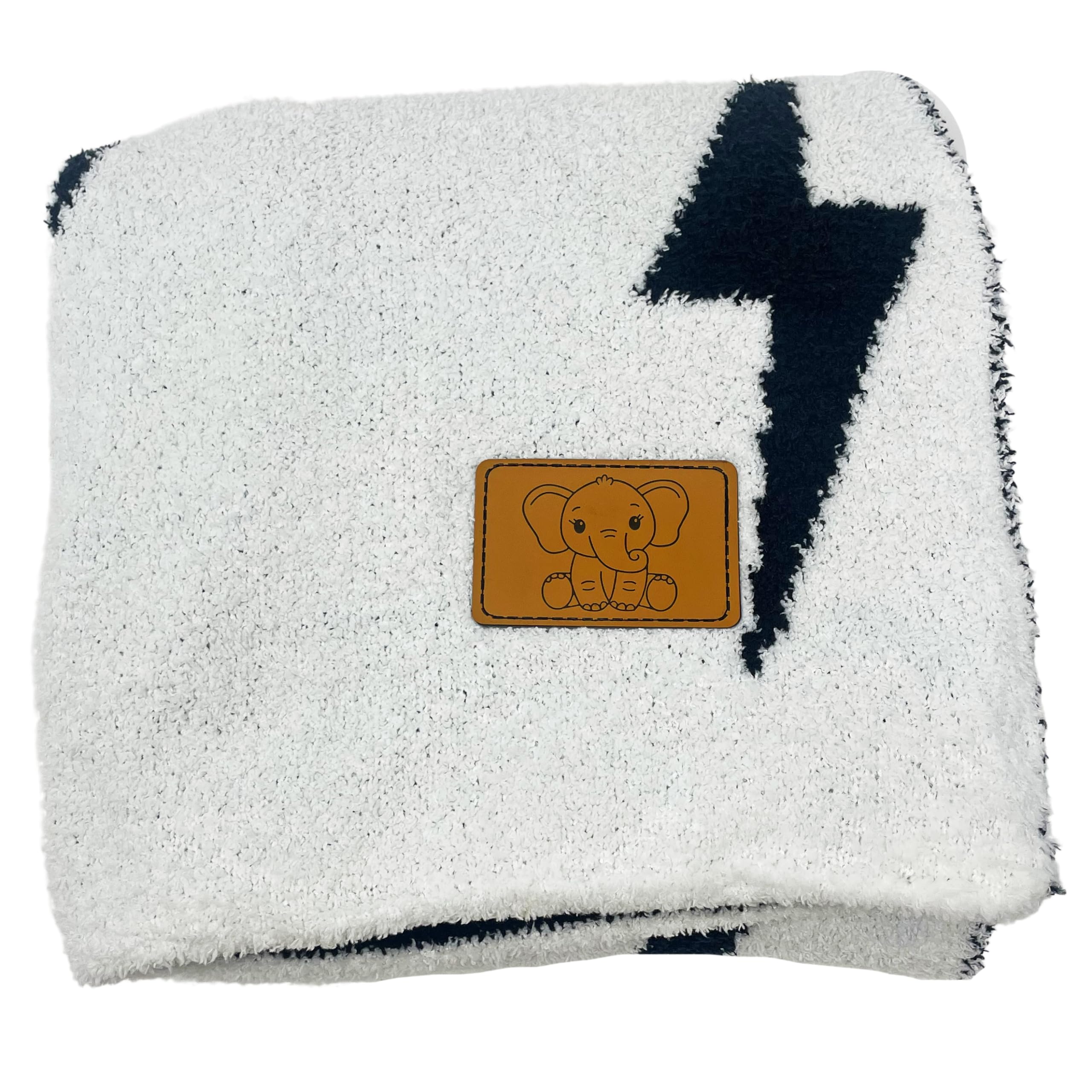 Leaps + Legends lightning bolt blanket with elephant patch adds nursery charm.