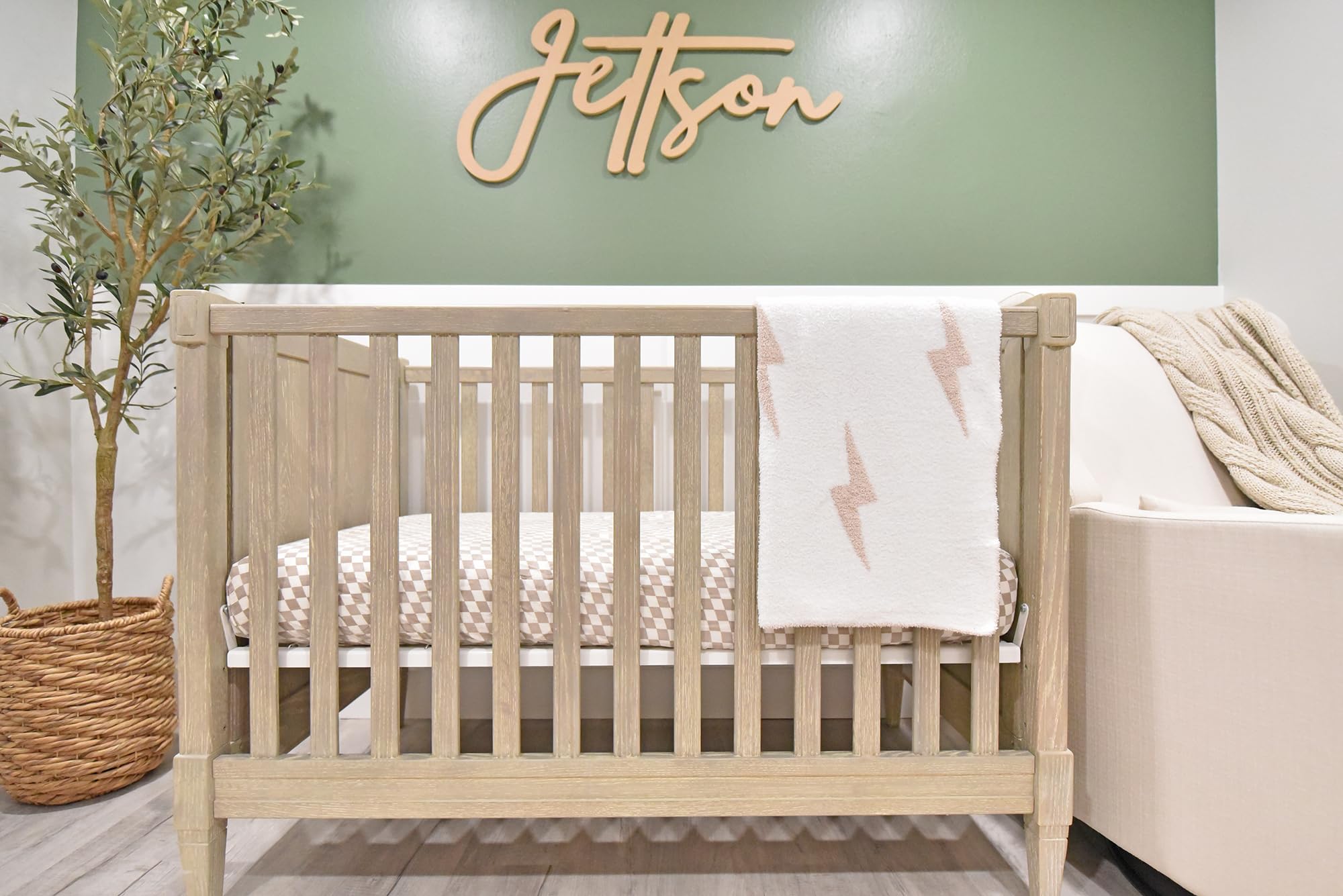 Leaps + Legends Lightning Bolt blanket in a kid’s room for everyday snugness.