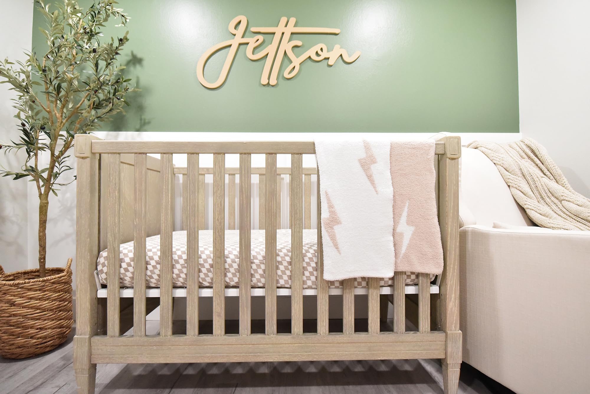 Leaps + Legends Lightning Bolt blanket shown as a soft playmat backdrop.