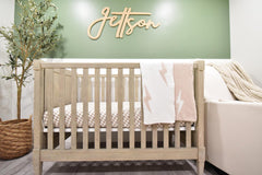 Leaps + Legends Lightning Bolt blanket shown as a soft playmat backdrop.