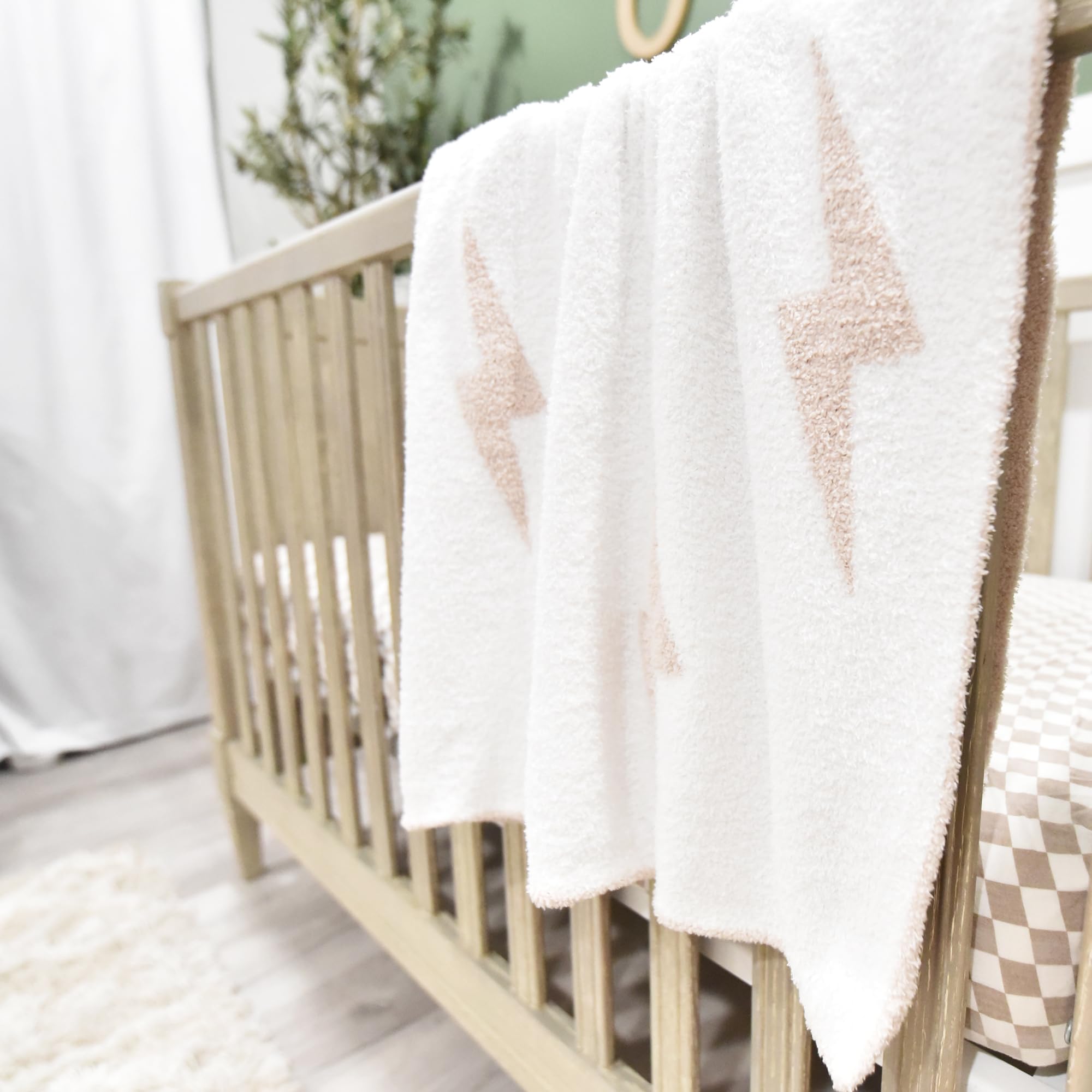 Leaps + Legends DreamSoft knit Lightning Bolt blanket emphasizes plush softness.
