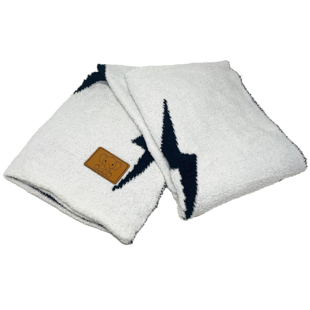 Leaps + Legends lightning bolt blanket care and machine washable design.