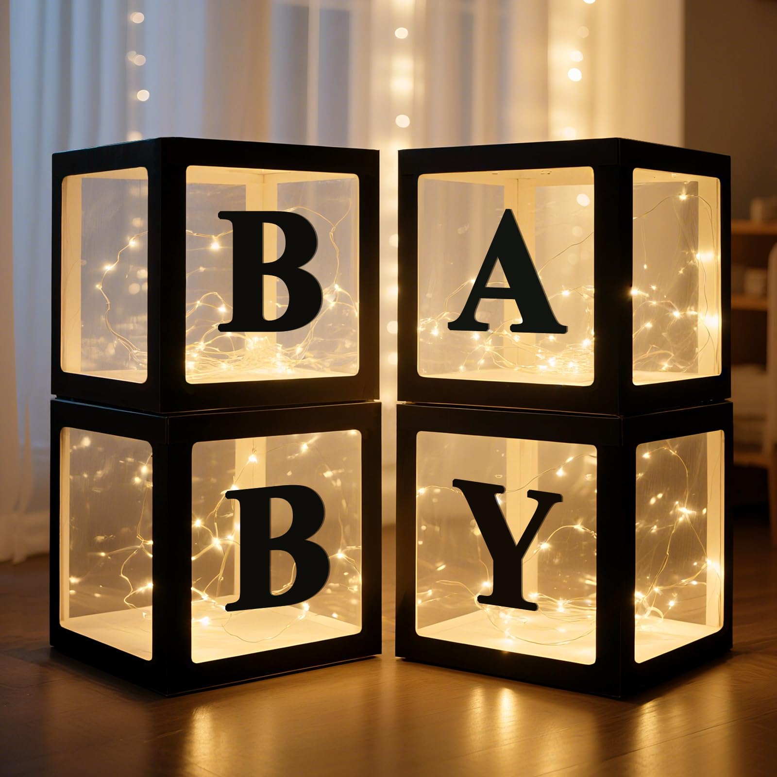 Ledido four-pack black baby boxes create a chic photo backdrop for showers.