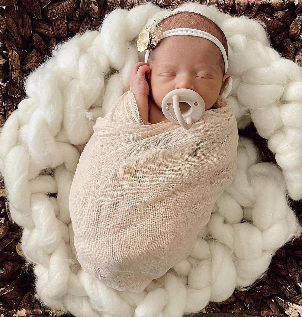 Lee Lee + Me Paci 100% medical-grade silicone, BPA-free, for safety.