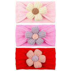 LemonSpace baby headband with big sunflower for stylish newborn outfits.