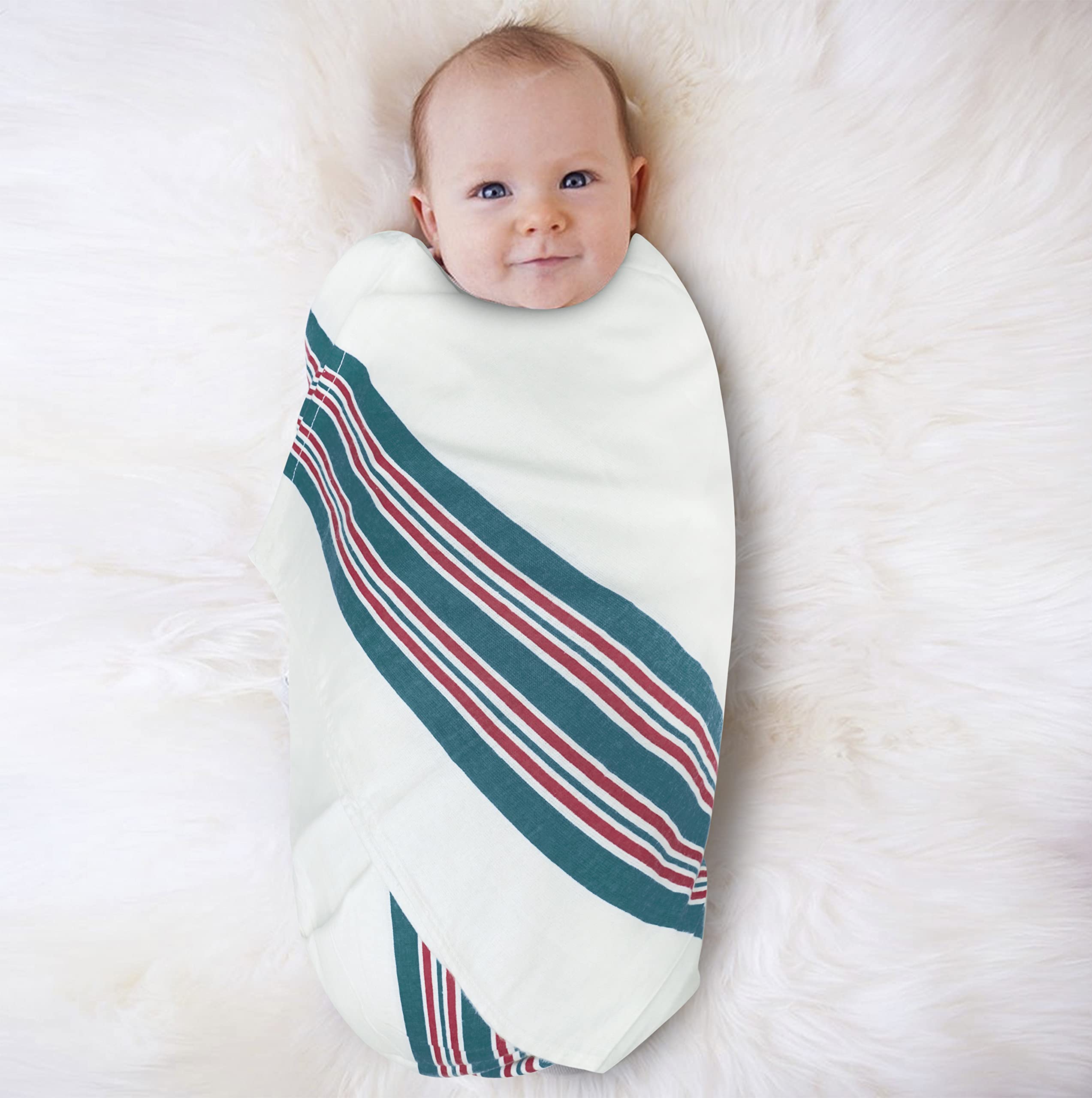 Lenenz blanket used as a light burp cloth in a pinch.