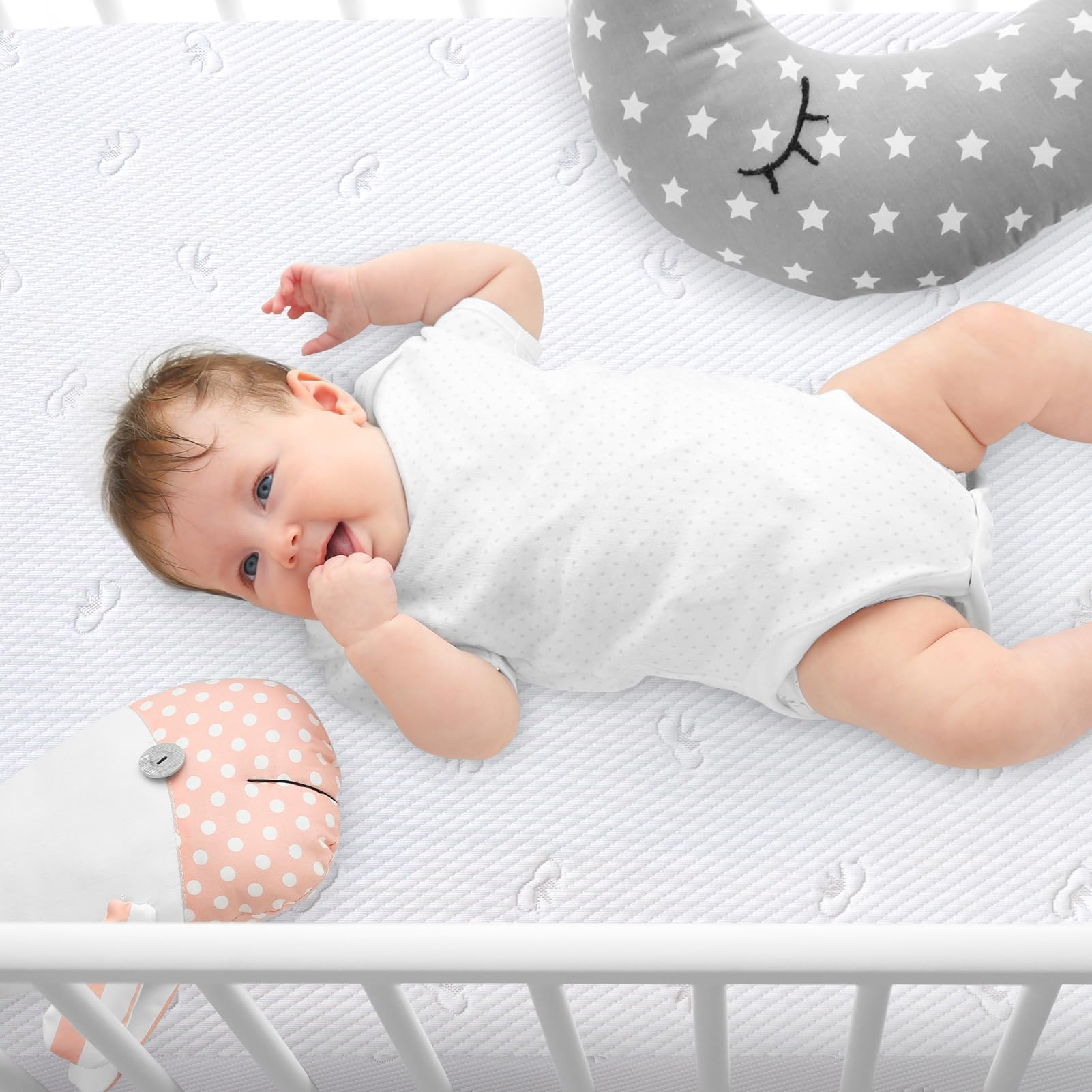 Letmxiu waterproof crib pad protecting against spills and accidents.