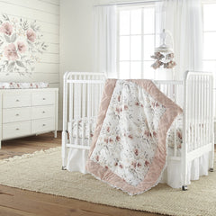 Levtex Baby Adeline sheet coordinates with other Adeline nursery pieces for a cohesive space.