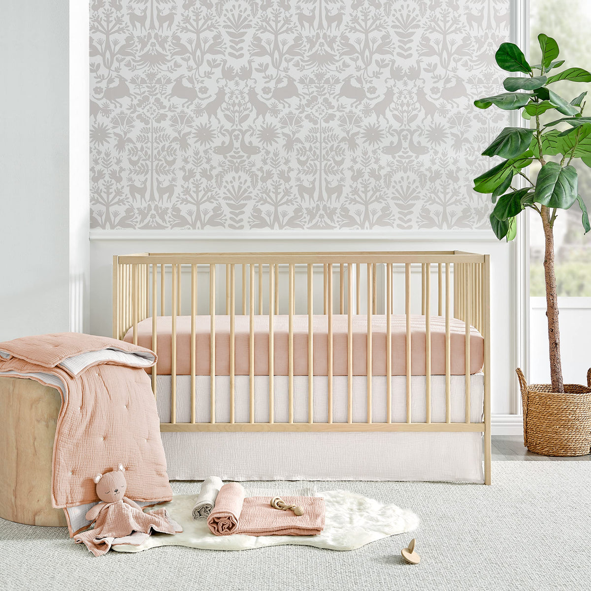 Levtex Baby Cloud Muslin Crib Set close-up of pink flowers on white for serene nursery vibes.