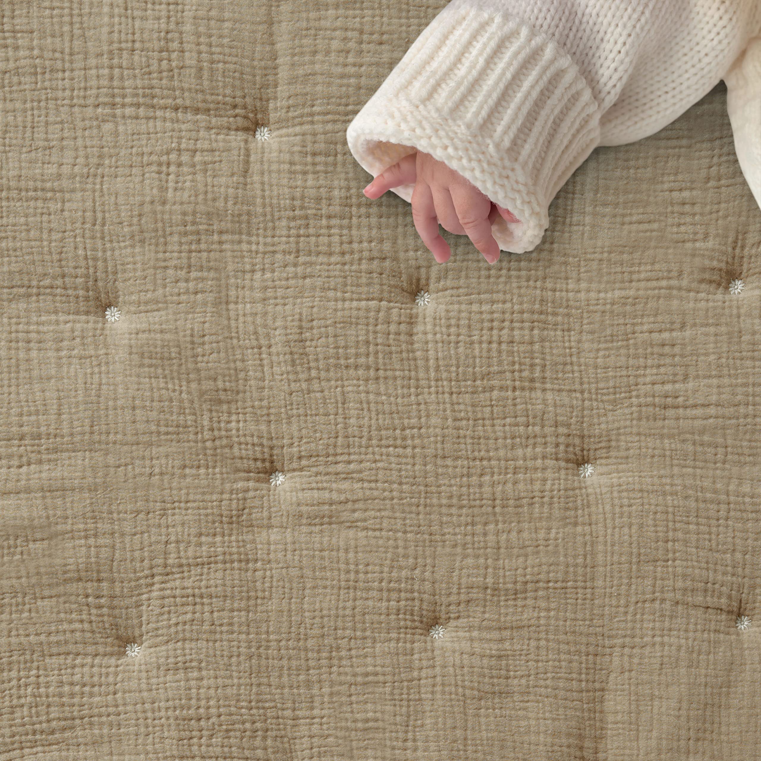 Levtex Baby Cloud Muslin swaddle in cacao for versatile newborn comfort.