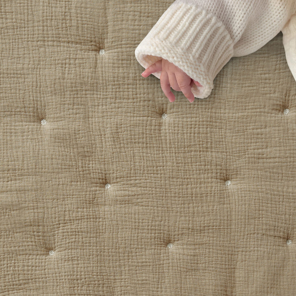 Levtex Baby Cloud Muslin swaddle in cacao for versatile newborn comfort.