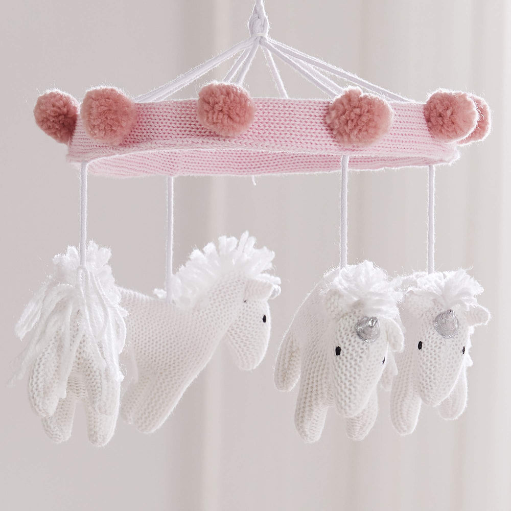 Levtex Baby Colette mobile featuring pink pom poms adds playful movement for soothing routines