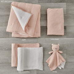 Levtex Baby quilt highlighting pink textured muslin with white stitching for cozy naps.