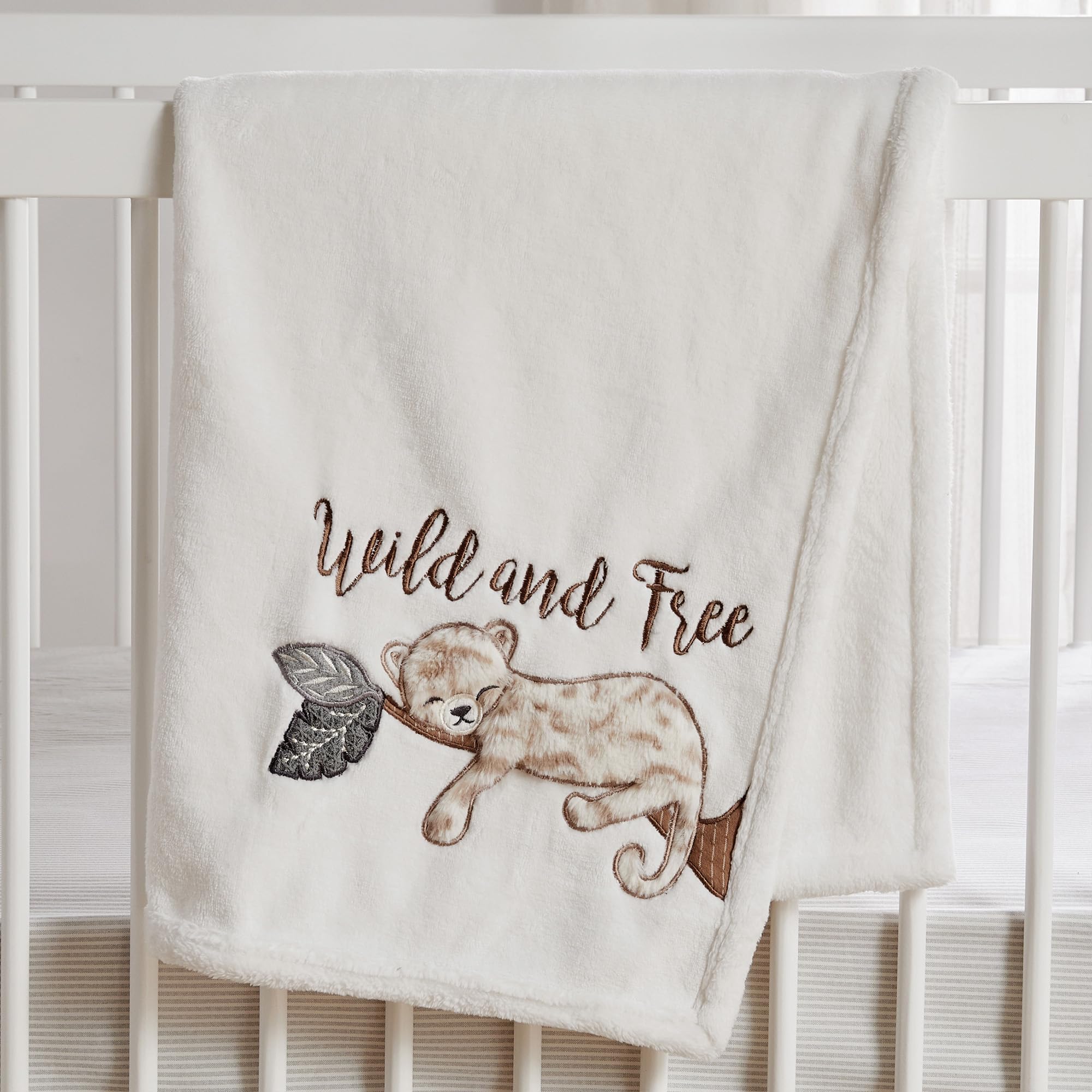 Levtex Baby Serengeti cream plush blanket highlights soft texture and easy daily care.