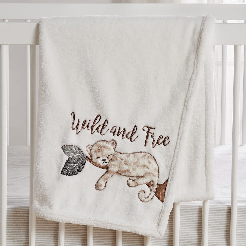 Levtex Baby Serengeti cream plush blanket highlights soft texture and easy daily care.
