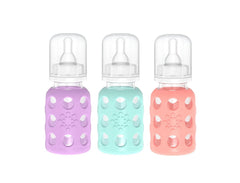 Lifefactory 4oz glass baby bottle with lavender silicone sleeve, easy to grip and clean.