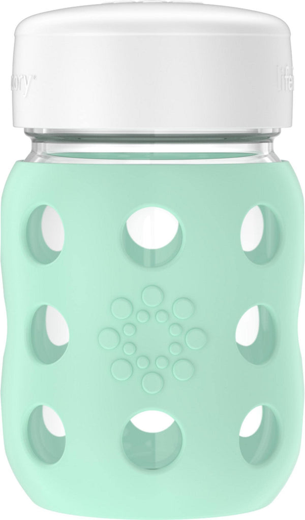 Lifefactory 8oz wide-neck glass bottle with mint silicone sleeve for easy feeding and grip