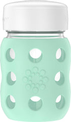 Lifefactory 8oz wide-neck glass bottle with mint silicone sleeve for easy feeding and grip