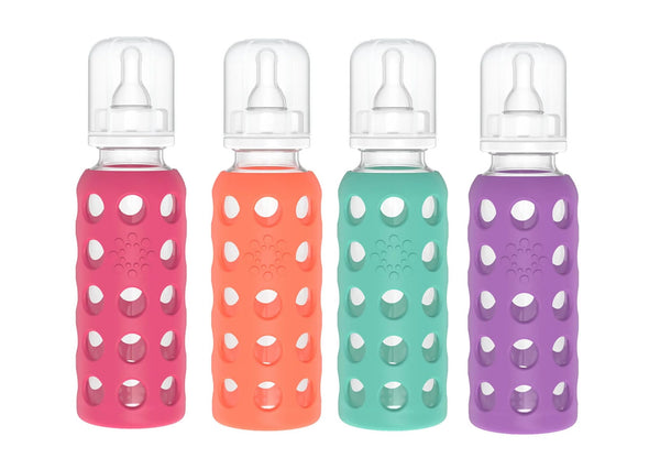 Lifefactory 9oz glass bottle with raspberry sleeve for easy gripping and feeding.