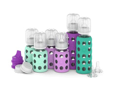 Lifefactory 4oz mint lavender bottle with silicone sleeve for secure grip and durability.