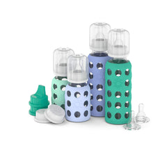 Lifefactory 9 oz Kale & Blueberry bottle with protective sleeve for secure handling.
