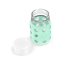 Lifefactory flat cap on mint bottle seals in freshness and prevents leaks