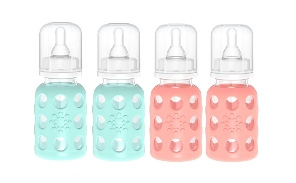 Lifefactory glass baby bottle with mint sleeve for easy grip.
