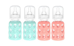 Lifefactory glass baby bottle with mint sleeve for easy grip.