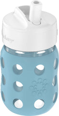 Close-up of Lifefactory silicone sleeve on a blue denim bottle