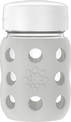 Lifefactory wide-neck baby bottle with silicone sleeve for easy grip and safe handling