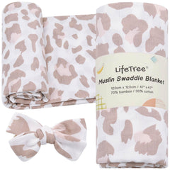 LifeTree baby muslin swaddle blanket in blush leopard for gentle comfort.